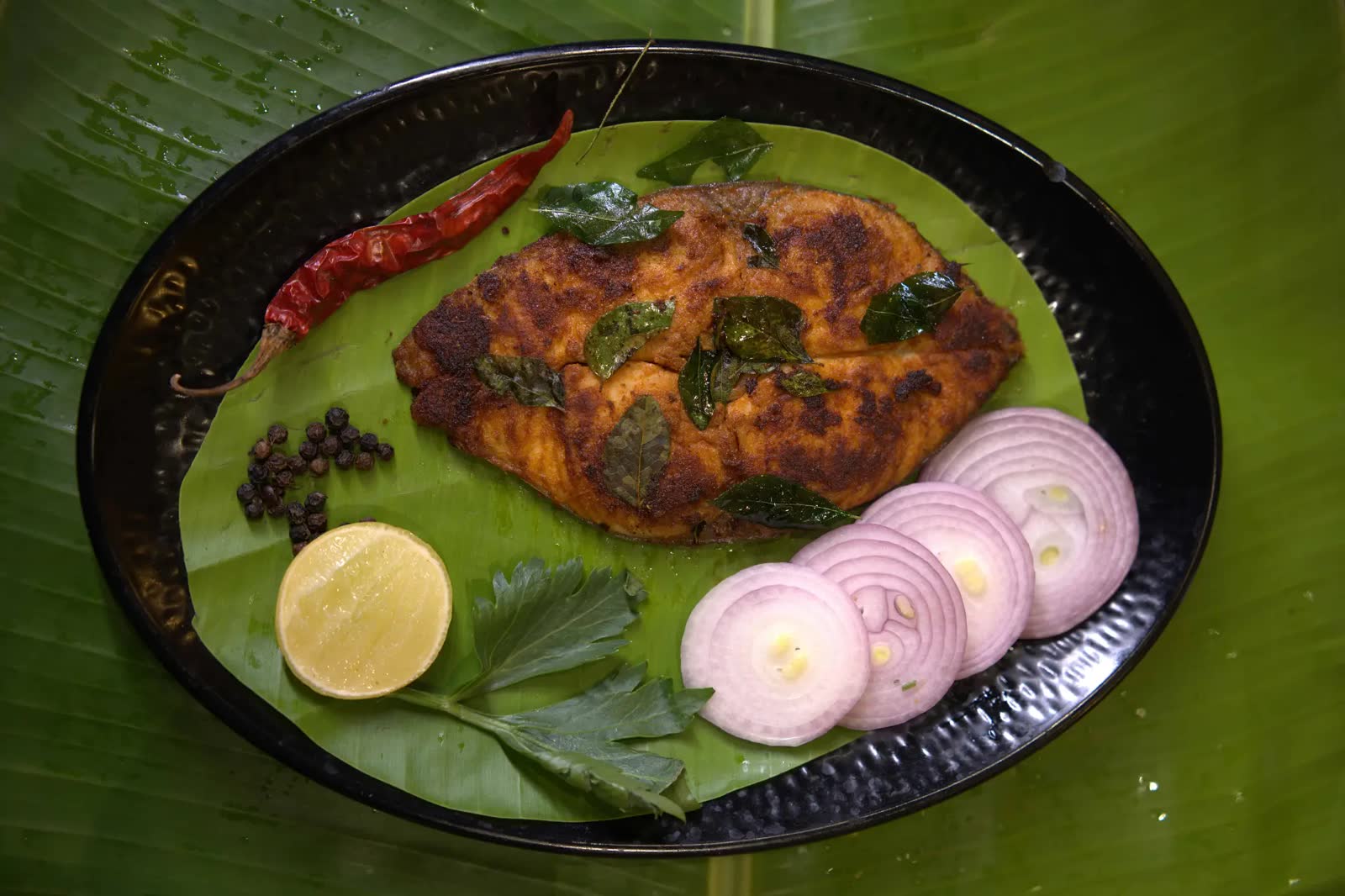 Fish fry with curry leaves and onions